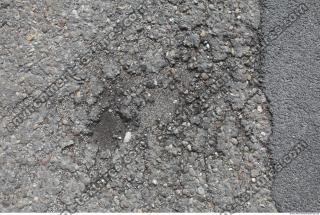 ground asphalt damaged 0001